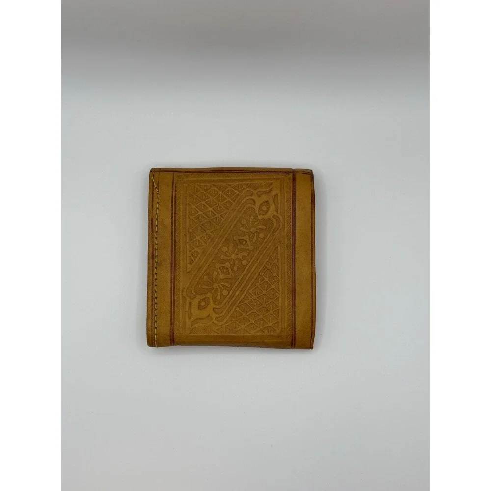 Handcrafted Moroccan leather wallet featuring snap closure